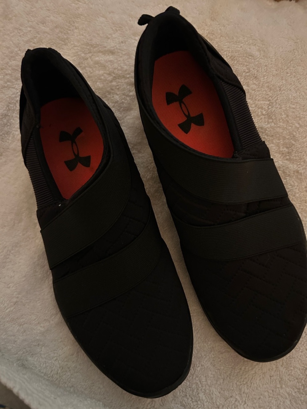 Under Armour Black Slip-On Sneakers with Orange Inners